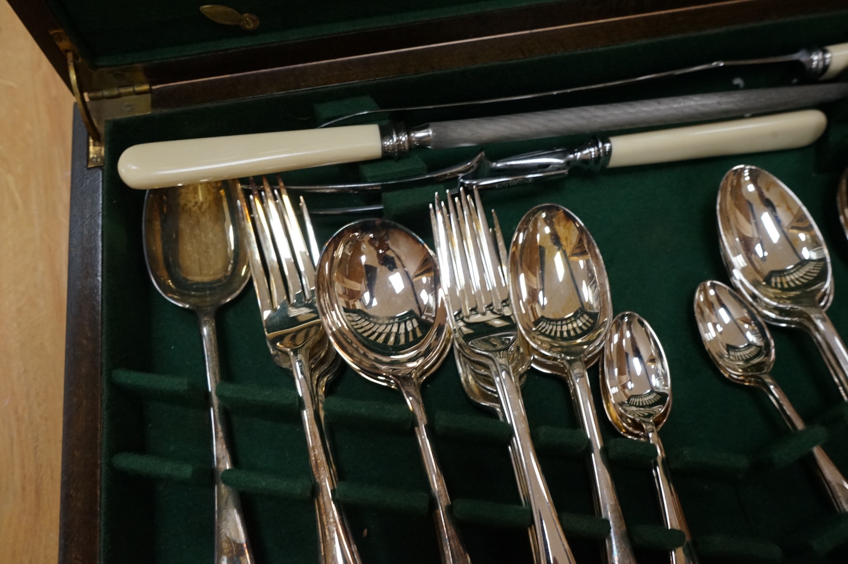 An oak canteen of silver plated cutlery